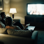 an_ultra-realistic_cinematic_nighttime_photo_of_a_stylish_living_room_illuminated_by_soft_lamps_and_b92zggy6qoxzl6kppy3r_1